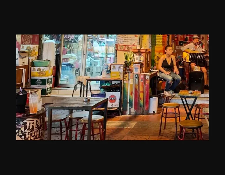 Outdoor stools and tables at Kalanbatu